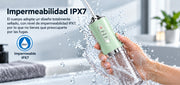 Irrigador bucal verde resistente al agua IPX7 bajo el chorro de agua