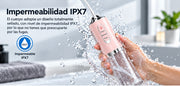 Irrigador bucal rosa resistente al agua IPX7 bajo el chorro de agua